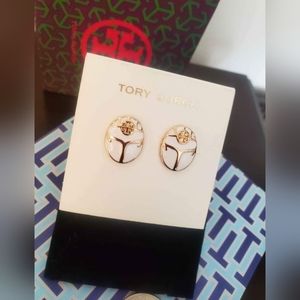 White and gold earrings by TB